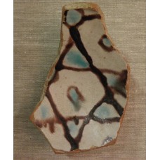 Glazed clay piece of a bowl with a star of David design